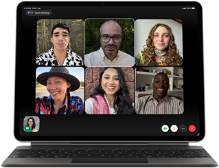 iPad Air, attached to Magic Keyboard, Black color, Group FaceTime call on screen